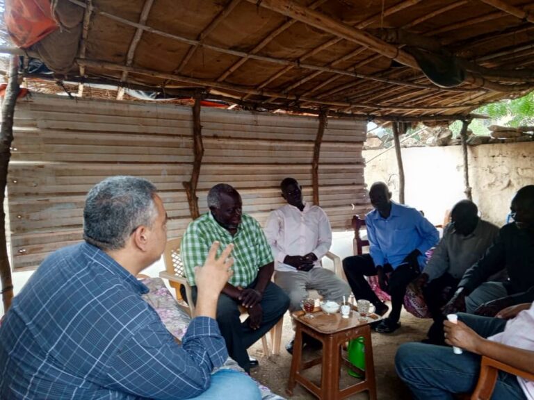 Rafat Samir (left), General Secretary of the Sudan Evangelical Alliance meets with local alliance leaders in Sudan.